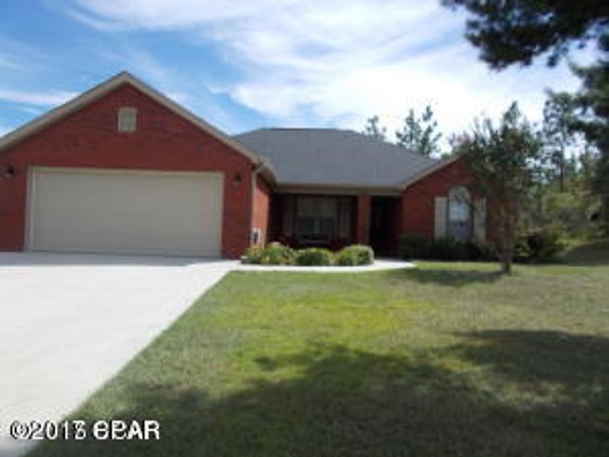 'WOW'' is what you will say when you see this awesome ''Custom Brick'' home. A very relaxed style with loads of comfort, just feels like home. Open and airy.Home features split floor plan, master off to it's self, three bedrooms , two full baths. Kitchen/dining area, den , Florida room, screened in porch to enjoy your morning coffee.Room for a pool. Backs up to a Preserve,no one behind you , place to park an RV. Double garage, lots of storage.

 Community Golf Course, Swim Park, lake for boating,very peaceful are. Best part it's only $175,000 for this amazing home.