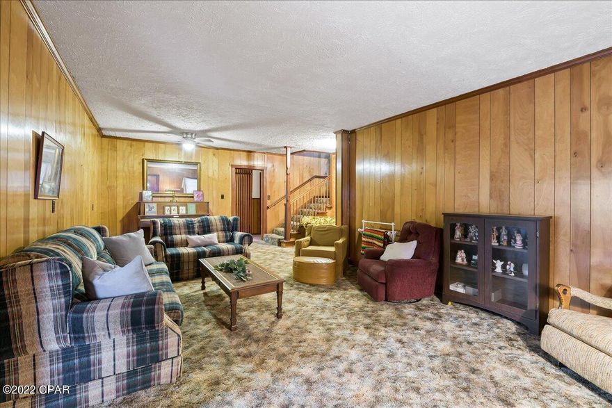 This sprawling estate on over 6 acres has endless opportunities. There are fruit trees galore. There is a detached garage and a detached shop. The property backs up to Hwy 231 and sits directly across from Round Lake.  The views are incredible. This home has amazing wood floors and so much potential. Your imagination is the limit when it comes to this property. The character and charm is incredible. You really have to see it to appreciate it. Call your favorite agent to see it today.