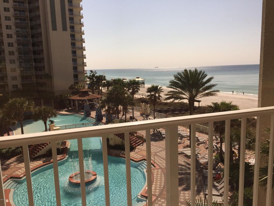 4th floor condo with 4th floor parking space.  Beautifully furnished and spacious studio overlooking the Gulf of Mexico. This unit offers a low floor so no waiting on an elevator and is close to parking garage. The interior features tile flooring throughout, granite countertops, washer/dryer and raised ceiling. This unit is very well maintained. Shores of Panama is centrally located to shopping, restaurants and entertainment. The resort amenities include expansive beach frontage, large Lagoon style pool, an indoor heated pool, fitness center, spa, tiki bar & grill, and summer activities that are fun for everyone.