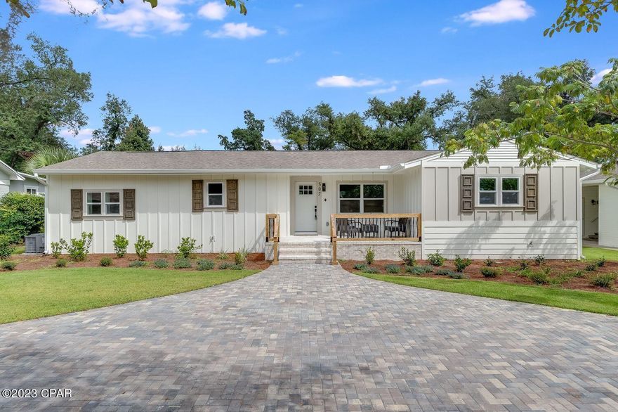 Currently under contract, seller considering back up offers. Welcome to an incredible opportunity to own a beautiful 4 bedroom home with an office that has been completely renovated in the highly desired Cove neighborhood! This home sits on a quiet street and is just steps from the water on Bunkers Cove Road where you'll enjoy neighborhood parks filled with waterfront swings and a kids play area. This home has been tastefully remade new and was taken down to the studs with a complete renovation by Southern Belle Construction. 

The exterior includes all new siding, a gorgeous brick clad front porch and charming landscaping with a pavered circle driveway. Step into this 1850 square feet home and you're greeted by original Cove hardwoods that have been refinished, new windows, doors, electrical, plumbing, HVAC, hot water heater and foam insulation under the subfloor and under the roof for a huge advantage for efficiency of the home. The spacious dining room offers a new electric fireplace and large windows overlooking the front yard. With the open concept, the expansive kitchen island is perfect for entertaining with access to the dining and living room. The kitchen features custom cabinetry, beautiful Quartz countertops, new stainless appliances, a white apron sink and a custom-milled wood range hood. The living room is just off the kitchen and provides excellent natural light and access to the oversized deck on the back of the home overlooking the large fenced back yard. This back yard offers alley access perfect for accessing the yard with your RV, boat and the lot is plenty large enough to add your own POOL! There is also potential to add an additional dwelling unit in the back yard with alley access which could be great as an income producing property. The Cove is a NO HOA neighborhood.

The design on this home is impeccable with the custom trim color throughout, refinished hardwoods and modern finishes! The home offers a split floor plan with a true primary suite behind the kitchen area past the laundry and pantry. Step into a dream with soaring high ceilings in the bedroom and a bathroom with a soaking tub, large walk-in tiled shower with dual shower heads and vanity. Behind the primary bath is an incredible space that features a walk-in closet, large sitting area and a space that can flex as an office. With the flexibility of this space, you can even make your closet dreams come true and design a massive walk-in primary suite closet! A sliding door gives natural light to the primary suite and also easy access to the back yard. This primary suite is a MUST SEE!

The opposite side of the home features 3 bedrooms with spacious closets and a gorgeous guest bathroom with modern tile and fixtures. You'll notice the incredible attention to detail on this Cove home with custom trim throughout, hardware, lighting and more. No detail was overlooked in this restoration of a beautiful home in a quaint historic neighborhood. The Cove neighborhood is golf-cart friendly, offers many neighborhood public parks and is well-known for the 100 year old oak tree-lined streets. 

This is the kind of home you buy for forever and the Cove has become a neighborhood where families remain for a lifetime. Don't miss your opportunity to see this incredibly renovated home in the Cove!