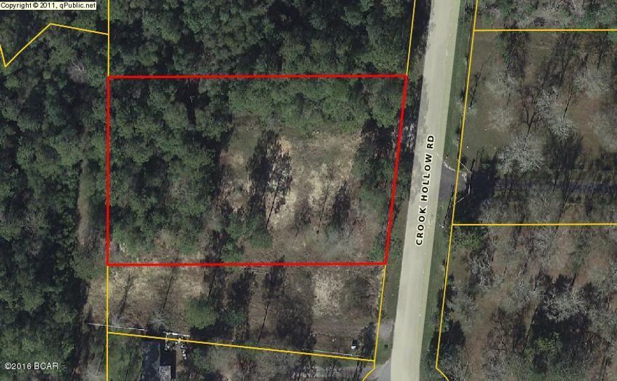 Large 1.66 acre lot to build custom home or mobile home.  Property has a well in place, however there are no warranties.