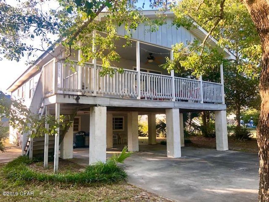 Priced for a quick cash sale, well below the full retail price of $200,000. BEACH HOME on huge lot!  Ideal for investors seeking high return rental, or flippers as well as those seeking primary residence, vacation home rental or second home on the beach.  Upper floor is rental ready(1152 sq feet), while lower floor has some walls but needs complete build out (768 square feet). Two story beach home on quiet street off Route 98 in west end of PCB close to beaches, recreation, shopping, restaurants and 30A. Cash buyer offers preferred but will consider pre-approved as well.  Offers should be made after desired inspection(s) and on Seller's contract form attached to listing.

Room sizes are approximate. Please verify if important.