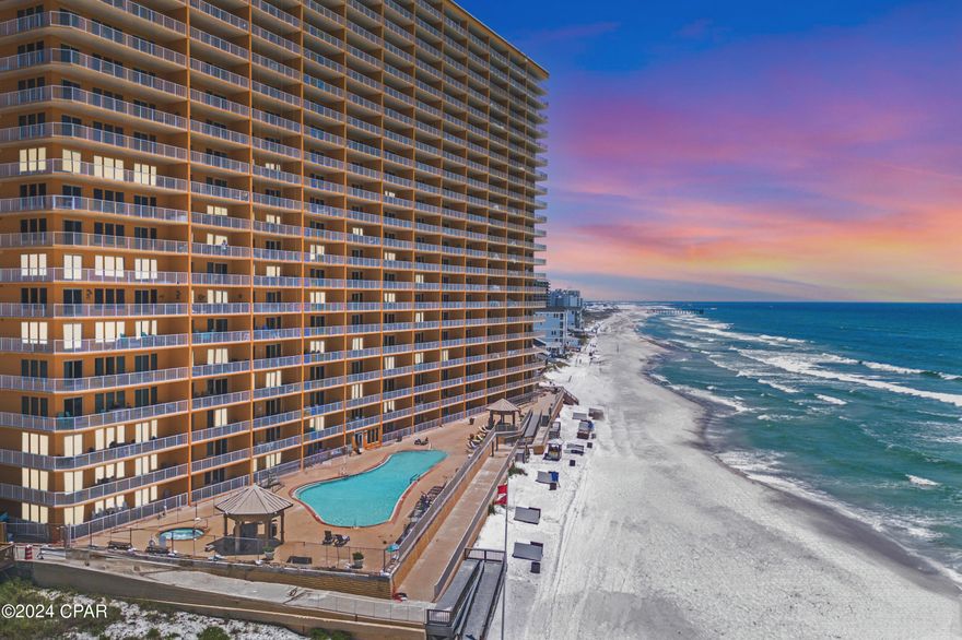 An Epic PCB Opportunity. Discover a RARE gem at the east end of Thomas Drive - a middle condo on the 17th floor with ICONIC Gulf Views at Treasure Island Resort. Enjoy the convenience of your private parking space and walking straight off the elevator directly into your condo. Simply walk straight into paradise at 5004 Thomas Drive, Unit 1707. This breathtaking, fully renovated condo comes fully furnished and equipped with all the bells and whistles for a perfect home, vacation getaway, or investment property. Completely redecorated & redesigned, this stunner features new furniture, artwork, and stunning decor throughout the 2-bedroom, 2-bath gem AND just newly painted! Both bedrooms feature king beds with new mattresses, and there's a bonus set of bunk beds built into the wall with a ladder, accommodating up to eight guests to maximize space and rental income. The open-concept kitchen boasts beautiful granite countertops, updated kitchen appliances, and everything you need for cooking — truly turnkey at its finest. Treasure Island Resort Condominium is near St. Andrews State Park on the east end of Panama City Beach. This area is filled with great local restaurants and outdoor activities, making it the ideal place to vacation, live, or both. Life is meant to be experienced, and Treasure Island, Unit 1707, is the epitome of just that!