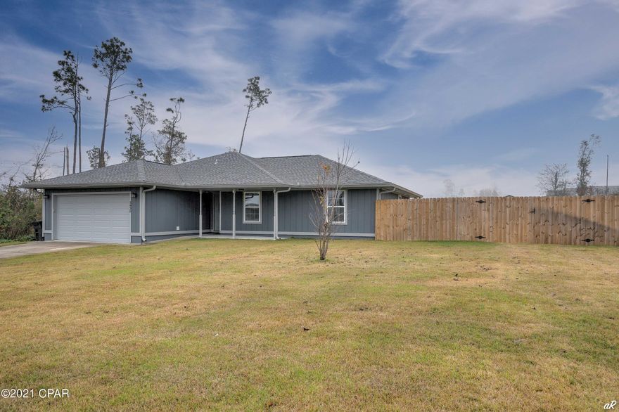 Must see home on over half an acre fully fenced backyard with carport, irrigation, new sod and double gates perfect for parking your RV or boat. Kitchen has been fully remodeled in 2019, granite countertops, LG appliances, wood cabinets with soft close cabinets and drawers, pantry, tile flooring in kitchen, dining and bathrooms, luxury vinyl Pergo flooring in main areas and bedrooms. New lighting throughout the house, wood burning fireplace, cathedral ceilings in living room. All new windows and back door replaced in 2019, water heater in 2017, AC unit 2018, roof replaced in 2019.  Home has lots of storage, new garage doors, no ditch in front yard, master bathroom remodeled in 2019. Perfect starter home, in a great location! Shed conveys with property.