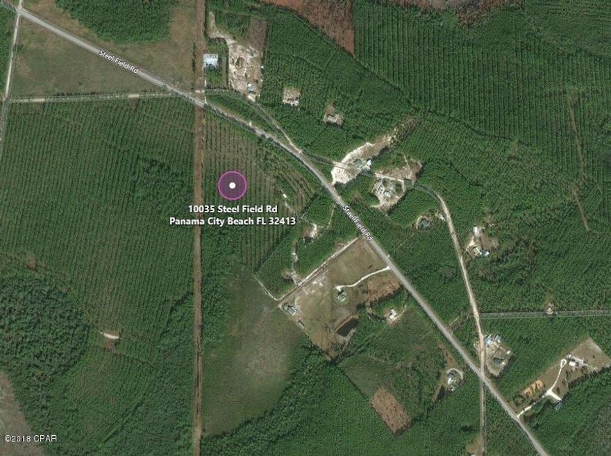 11.8 acres located off of HWY 79 - Perfect location to build your dream home! This is a very desirable area that is steadily growing.  Enjoy your privacy while still being in close proximity of the beach and Pier Park.