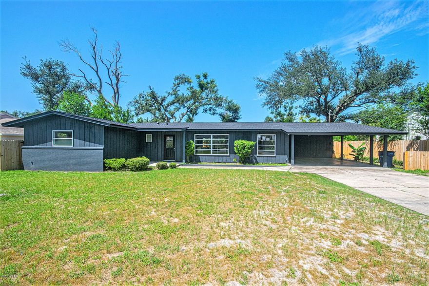 CURRENTLY UNDER CONTRACT, SELLER ACCEPTING BACKUP OFFERS...............Amazing opportunity to own in the historic Cove, this spacious 3-bedroom 2 bath home has it all! New LVT floors welcome you into the open concept living room with large windows that stream tons of natural light and lead into the generous eat-in kitchen where you'll find plenty of cabinets for storage, a gas range, a unique rolling island, and direct access to the large carport which boasts a separate heated and cooled bonus room. A formal dining room also sits adjacent to the kitchen for easy entertaining and family gatherings. Down the hallway, the master suite is found with double closets and an en-suite bathroom as well as two additional bedrooms and another full bathroom. Enter the large screened in back porch, great for weekend BBQs or relaxing in the afternoons, through sliding glass doors off the living area or through the ample sized laundry room. The huge privacy fenced back yard has alley access through a heavy-duty double gate, a nice sized storage shed as well as an outdoor shower. Throughout this amazing home you will find unique mid-century touches, newly installed carpet in all the bedrooms and thoughtfully placed custom features. This gem is located just around the corner from the St. Andrews Yacht Club boat launch and just a short bike or golf cart ride away from downtown Panama City's many fantastic restaurants and venues, great schools, and St. Andrews Bay.

(All sizes approximate and taken from public records, Buyer to verify any and all details Buyer deems important.)