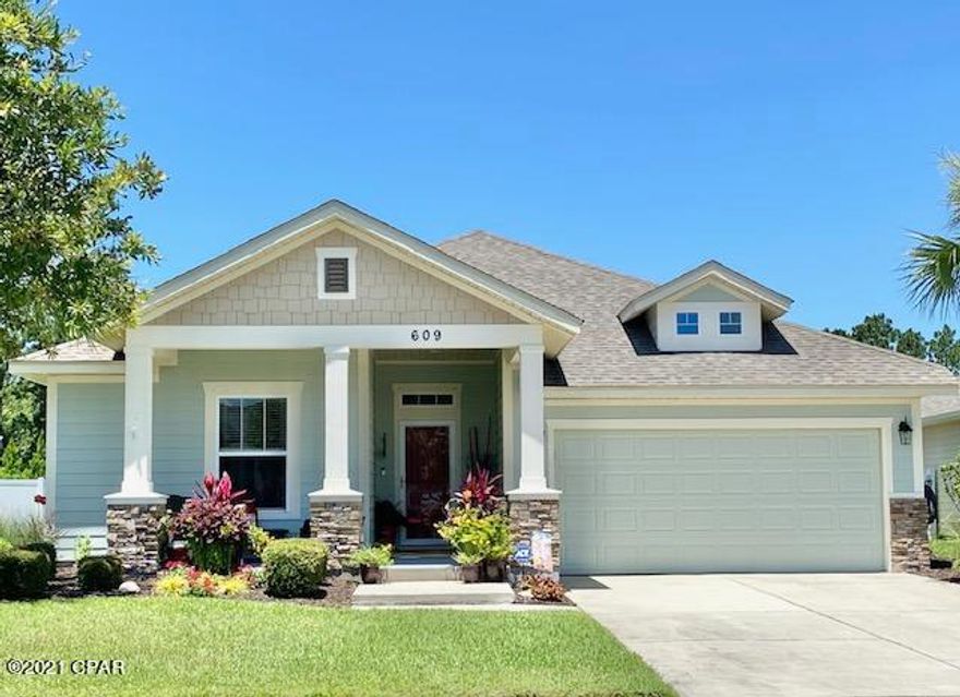 UNDER CONTRACT... ACCEPTING BACKUPS!  Beautifully landscaped and recently renovated with a private fenced back yard on a large pond. Completely repainted, kitchen cabinets redone, new granite and new sink in kitchen, new quartz and faucets in master bath. Great location within the community that is close to the main entrance, school and shopping.  Enjoy the Breakfast Point lifestyle in this 3 bedroom 2 bath David Weekly Home.  This home has many upgrades including coffered ceiling in the master bedroom, crown moulding, a built-in desk and back pack rack, window in the laundry room and covered patio!  Enjoy the year round beauty of the water view from the main areas of the home. Plus, room for your dream pool. Don't miss this lovely Breakfast Point Home!