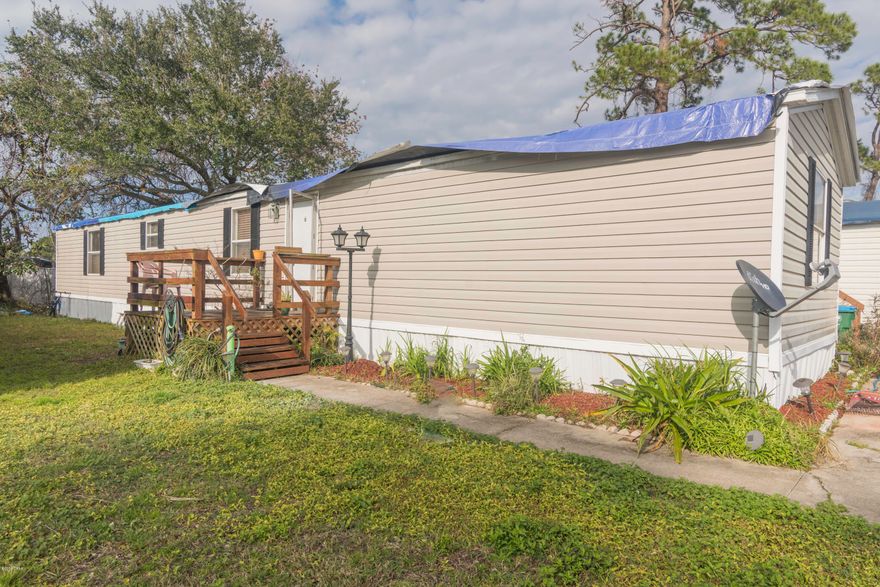 CHECK OUT THIS 3 bedroom, 2 bathroom  mobile home with 1,216 sf located one street off Front Beach Road in The Pines on a cul-de-sac street in Panama City Beach, FL! This home is centrally located and in close proximity to Gulf Coast College, the Navy Base, Panama City Port Authority, popular dining, shopping and entertaining as well! Homeowner is replacing roof, carpet and front door! Washer/Dryer will convey with sale! Verify measurements if important.