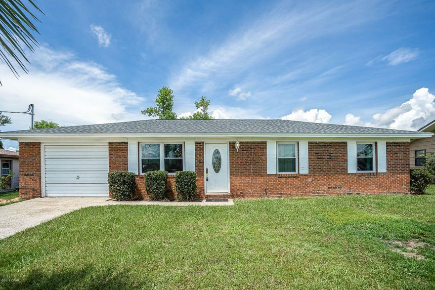 New roof on this all brick three bedroom two bath home in Callaway complete with fenced oversized back yard,   Enjoy cookouts on the large back deck.  Home also has a one car garage. You will enjoy the tile floors in the entire house.  This house is ready to be your new home.  Call your agent today as house is priced to sell!