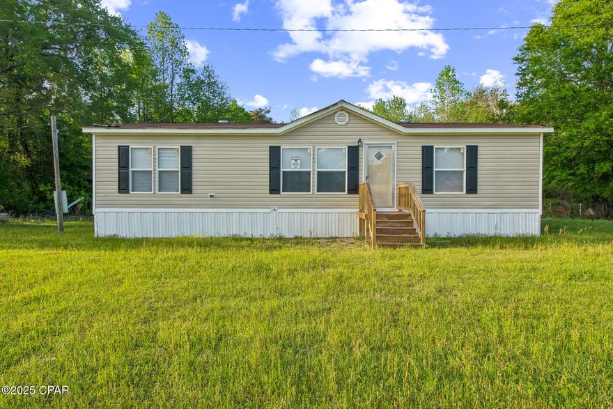 Enjoy peaceful country living in this 3-bed, 2-bath 2014 Southern Energy home on 1 acre with a private well and septic. Recently updated with new front deck, new flooring, fresh paint, and brand-new appliances, this home is move-in ready! Located in a quiet rural setting but still a short drive to town. Title is retired and home is permanently affixed to the land. Buyer to verify all measurements and details. Possible seller financing available for approved applicants. Don't miss this opportunity—schedule your showing today!