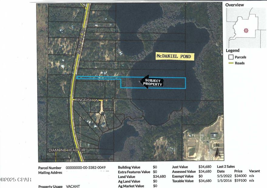 Seller is motivated...with price reduction 7/29...its time to sell! Nice approximate 1.5 acre site on Moss Hill Road and McDaniel Pond/Lake. Narrow (over 700 foot) access strip opens up to larger waterfront (near .8ac) site on lake. See attached aerial photo and developer survey for approximate land size and layout. Tax records say over 6 acres - but much of that is under lake (see aerial). The usable total land space is nearer 1.5 acres. Copy of developer restrictions are also attached. Seller is ready to sell with this reasonable ask price. No mobile homes.  New dwellings must be site built and minimum of 1000 sq.ft living area. Seller financing is not offered nor being considered. A great and serene get away location yet with convenient access ...just 10 minutes from Vernon or Wausau - 15-20 min to Chipley, and about 20-35 minutes north of Lynn Haven and Panama City. Drive time to Bozeman School in Bay County is near 10 minutes. BE CAREFUL if entering property - neighbor to left has large dogs that are sometimes loose. They are mostly friendly but can be intimidating if not expected. Use caution and be carefully alert if entering or viewing this property. THERE IS A POWER LINE TRAIL CUT WITH POWER LINES TO NEXT DOOR NEIGHBOR (@ 4603 MOSS HILL RD), PER LISTING OWNER... SUBJECT PROPERTY IS ON RIGHT (EAST) SIDE OF THAT POWER LINE. SEE PLAT SURVEY COPY IN DOCUMENTS FOR LAND LAYOUT