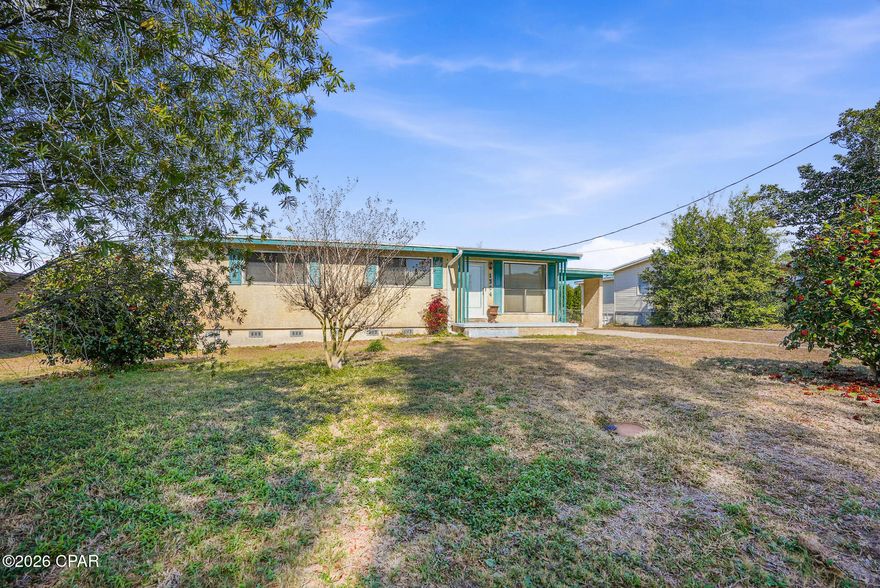 This 3-bedroom, 1-bath home sits on a spacious almost ¼-acre fully fenced lot and backs up to city-owned vacant land—meaning no neighbors behind you. Inside, you'll find a large family room and an open dining area overlooking the backyard. Hardwood flooring runs throughout most of the home, and the original kitchen and bathroom are ready for updates. Additional features include a one-car carport, outdoor storage room with laundry hookups under the carport, and a separate backyard storage building.
The home needs repairs and updates and is being sold as-is, making it an excellent opportunity for investors or buyers looking to add value. Conveniently located in the heart of Forest Park, close to schools, shopping, restaurants, and the hospital, and just 15 minutes from the World's Most Beautiful Beaches. Ideal for a rental, flip, or affordable entry into the real estate market.