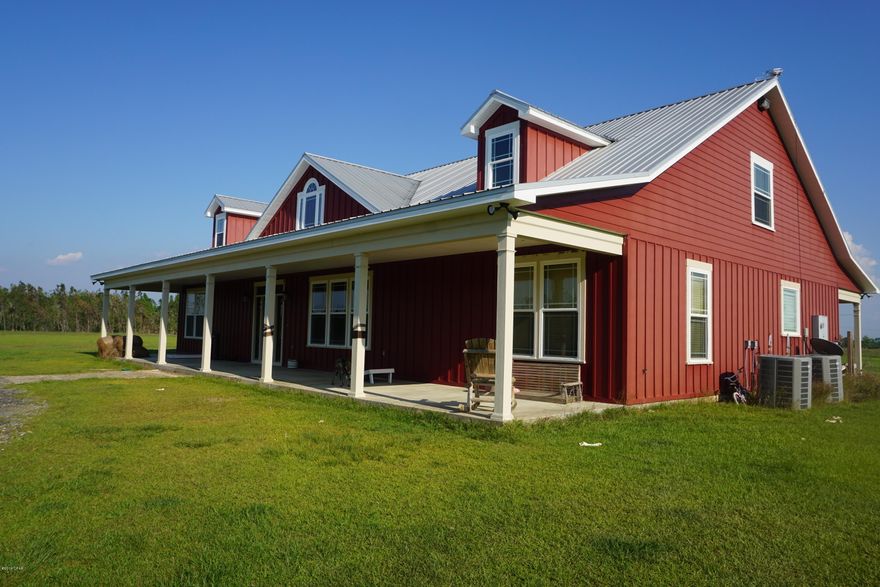 PROPERTY IS NOW UNDER CONTRACT; SELLER WILL ACCEPT BACK UP OFFERS.  Modern Farmhouse on 10 Acres!  This is a lovely 4 bedroom/4 bath home surrounded by fenced in pasture for cows or horses. The house is separated by  fencing and a cattle gap from the pasture. Features include an open floor plan with vaulted ceiling & gas fireplace in LR, spacious kitchen with double ovens, 2 sinks, cooktop and brick backsplash, a large pantry and laundry, extra living/loft upstairs, 2 bedrooms upstairs and 2 downstairs, large front and back porches.  The master bath has a large tiled shower, clawfoot tub, 2 sinks.  The house has 2 gas tankless instant hot water heaters and foam insulation. Downstairs floors are finished concrete