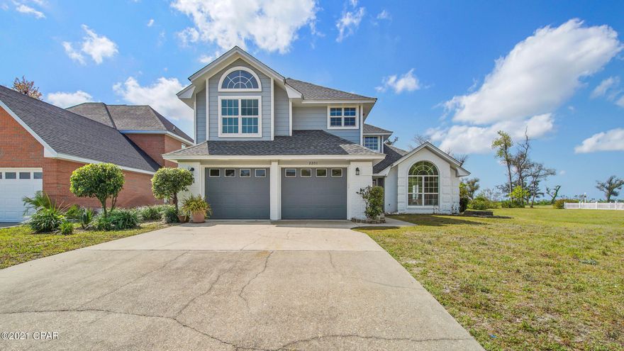 This lovely home is right on the Golf Course and yes, it's open! This listing is in the exclusive Panama Country Club- 4 bed, 3 bath and completely renovated since the hurricane. There is a nice backyard with beautiful views of the golf course from the back and the water out front! Granite counter tops in the kitchen, new cabinets and appliances as well. There is a community playground right out back to keep the kiddos busy and you can walk, bike or ride your golf cart down to the community pool. The owner's suite has a large tub, a separate shower as well as beautiful views of the golf course out the back windows. So many family events and outdoor activities in this neighborhood, it's a lovely place to live!