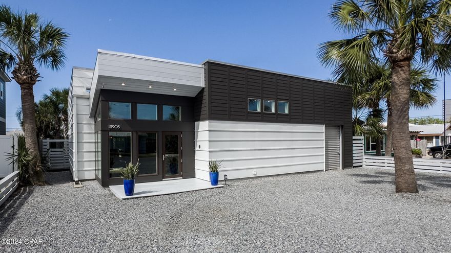 Ever wanted a one of a kind, unique Beach House  13905 Millcole Ave  is it .
Total Remodel in 2016 .Effective date on Property Appraiser Site 2019.The Builder even used a Lot of the Old Lumber and repurposed it into a dynamic interior design. This home is being Sold Turnkey and has  been ultra maintained and ready for a new owner . This home  has a Golf Cart (cart included with purchase of home) garage area and work shop combination.
It has a wonderful Pool Oasis Rear yard with Covered Tiki Bar area. Inside the Open floor plan boast a sitting room, Library area, Dining Family Kitchen area. Down the Hall to 3 Bedrooms Master Bedroom is a must see in person .Soaking Tub and stand alone shower .From the Master Bedroom or Kitchen / Dining step out onto a Sunroom  looking out over the Pool  and backyard. Also down the hallway is a Laundry Room with a great built in Desk / work area.
The Kitchen has Stainless Steel Appliances.   Gas Stove top and Electric oven .  Main Refrigerator and 2 Mini Refrigerators.
Huge Island makes for a bounty of Counter space and a Cooks dream . All of this and in the 1st block at Bid a Wee Dedicated Beach .
Just walk around the corner and take the short 300' walk to the Private Entrance Gate waiting for you. No HOA and NO Flood zone.