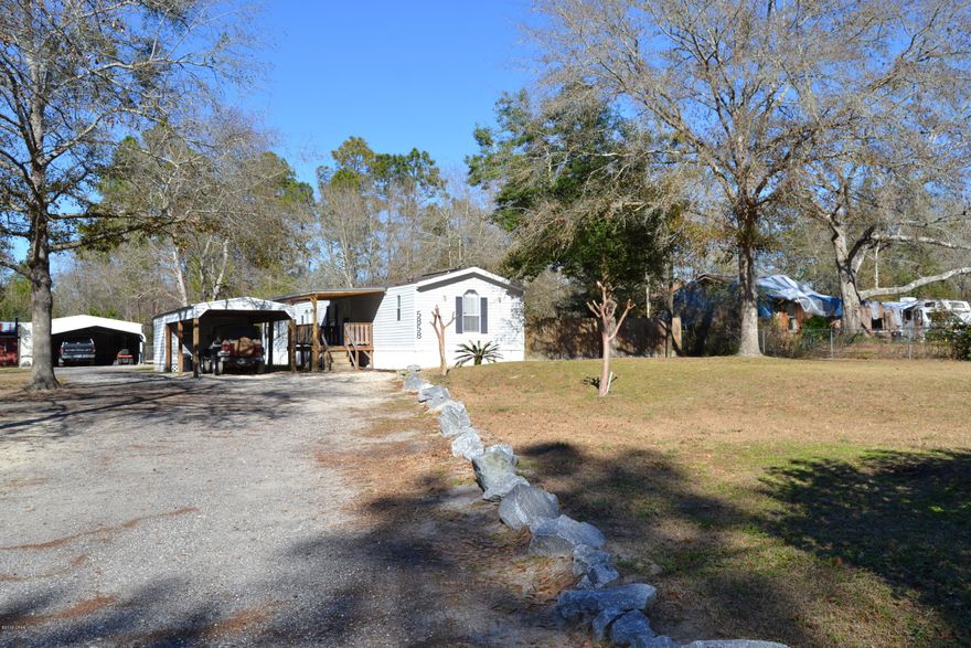 This is a great opportunity just outside of Panama City. This is not Just 5860 Joseph but also 5858 Joseph. Both lots and structures being sold as is together. 

Single wide with 3 bedrooms and 2 full baths gives you plenty of space. Patios, and deck space. Multiple sheds and workshops. RV parking and hookups. 2 wells and 2 septic tanks with lift station. This is an amazing opportunity to have a large 1.2 acre lot. With plenty of bonuses.