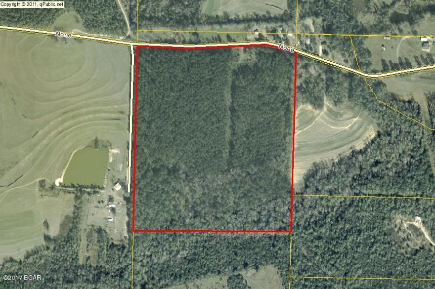 46 Acres of land in the country!!! Here's  the spot for that new home and horses! Parrot Creek runs through the SE corner of the property.Must see to appreciate!!! ---  Call today to set up a showing on this one!