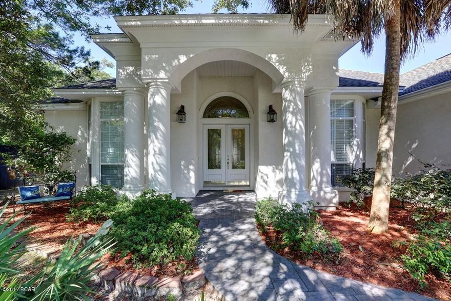 PANAMA CITY BEACH-GATED COMMUNITY-Beautifully maintained 3 BR 2.5 BA Preserve on the Bay home. This home has a superb location, meandering tree lined streets minutes from the Gulf of Mexico-Property is adjoining a preserved nature area. Beautiful home with high ceilings,fireplace, stainless appliances with custom cabinetry, lots of crown molding and fine high-end finishes. Includes a 16' x 32' swimming pool with patio area off pool perfect for entertaining and too many other features in and out to list. Professionally landscaped fenced private rear yard with sprinkler system. Please check room sizes and square footage for accuracy.