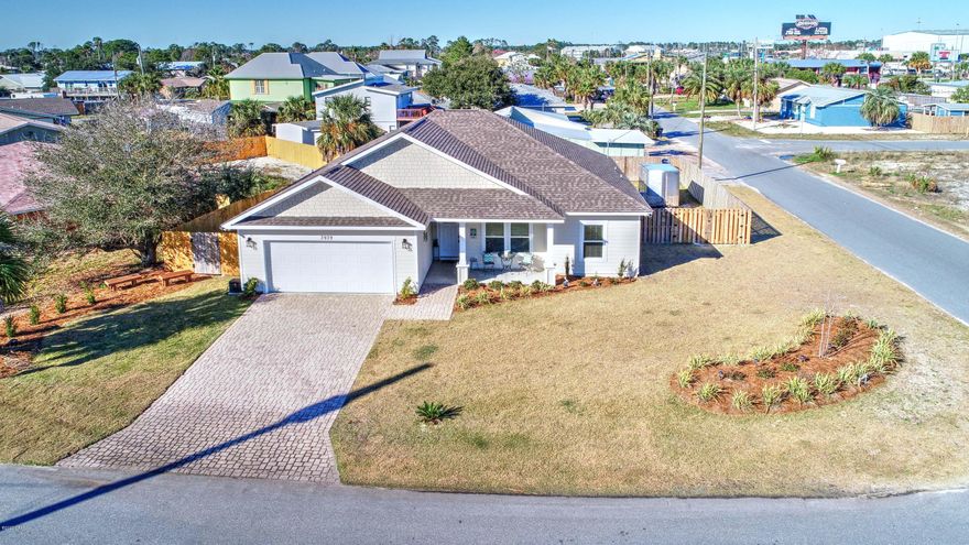 CURRENTLY UNDER CONTRACT, SELLER ACCEPTING BACKUP OFFERS. This is your OPPORTUNITY to own a GORGEOUS 4 bedroom beach home. Quality Built New Home (2018) located on the East End of Panama City Beach. The white sugar sand beach is just a 5 minute walk away. The attention to detail starts the moment you enter this stunning 4 bedroom, 2 bath, 1598 Sq Home. This beautiful home features open floor plan, tray ceilings, Quartz countertops, stainless steel appliances, pantry, modern ceramic tile in living room and bathrooms, master bathroom with double vanity, walk in closet and tiled shower with glass doors.  A covered back patio leads out to a privacy fenced in back yard along with a irrigation system. A covered back patio leads out to a privacy fenced in back yard along with a irrigation system.The fenced in side yard with a double gate is large enough to store a trailer or even a boat. Located close to numerous restaurants, shopping, boating, marinas, St. Andrew State Park and Navy base. This one is a must see!