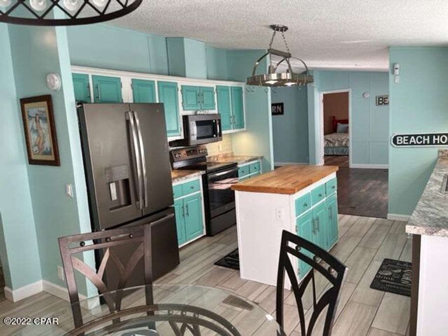 NEW SALE PRICE $339900! WOW!

BEAUTIFUL UPDATED BEACH HOUSE IN DESIRABLE

LAGUNA BEACH, JUST 2 BLOCKS FROM THE WHITE SAND AND BLUE GULF WATER.  LARGE 1850SF HOME WITH 3 BEDROOMS + 3 FULL BATHS.  WOOD BURNING FP IN LARGE LR/DR WITH OPEN CONCEPT.  LARGE CUSTOM SHED AND NEW WOODEN FENCE.  METAL ROOF. SHORT-TERM RENTAL IS OK - EARN APPROX $64,695 PER YEAR BASED ON VRBO! FULL AMERICAN HOME SHIELD WARRANTY INCLUDED. CALL NOW TO SEE THIS BEAUTIFUL PROPERTY! 

SELLER AGREES TO PAY UPTO $3000 OF BUYERS PREPAIDS OR CLOSING COSTS! 

NEW LVP FLOORING IN LIVING AND DINING ROOM, NEW COASTAL PAINT