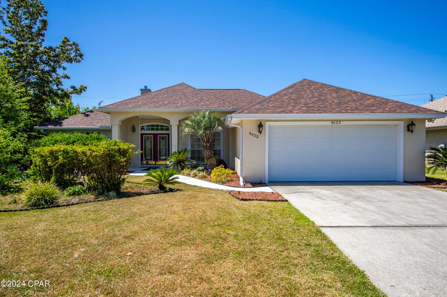 This stunning residence resides within the charming community of Delwood Point at the Preserve. Positioned with convenience in mind, it offers easy access to shopping, recreational activities, and the nearby Navy Base. Inside, discover a thoughtfully designed layout with a split floor plan and an inviting open concept. The generously sized primary bedroom boasts an ensuite bathroom complete with soothing jets and a separate shower, complemented by a tray ceiling and a spacious walk-in closet. The kitchen features updated countertops, ample storage, and a sunlit breakfast area. Additionally, the home is equipped with hurricane shutters and a backup generator system, ensuring comfort and security during power outages.