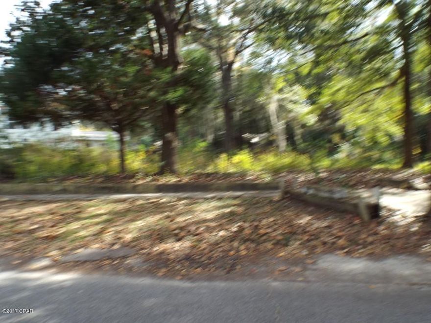 reduced!!! Irregular shaped lot on corner of 5 Ct and Massalina across the street from Massalina Bayou offered as is.  Property had an old home on it that was demolished and removed.  All sizes are approximate and/or taken from other sources please verify accordingly.