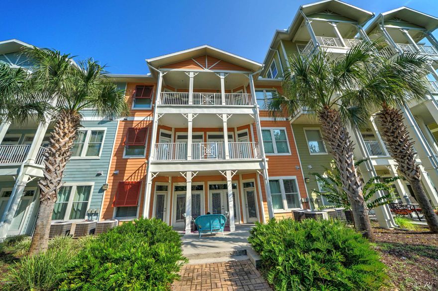 This unit is a must see on the ground floor at Island Reserve.  A great place to live, a vacation home or for long term rental.  Island Reserve boasts great amenities including a one acre lagoon style pool great for all ages with soothing waterfalls and a splash pad for kids.  The community building includes a game room, basketball court and fitness center.  Enjoy the relaxing scenery around the unit, the courtyards and pool.  Florida living at its best!  This unit has tile and wood floors, granite counter tops, stainless steel appliances, two master suites, and a large patio.  Close to garage.