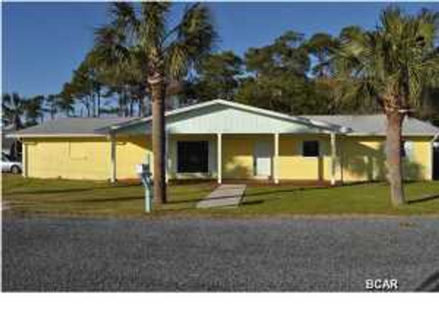 Just one block from the beach is this fantastic Inlet Beach Heights home with 3BR/2BA and an attached 2BR/1BA apartment. Spanning three lots and situated on a corner, the home has been updated, repainted, new carpet and flooring added, and is move-in ready. Features inside the main home include a Florida room, formal living and dining room, family room, walk-in closets in all bedrooms and extra storage. The apartment would be wonderful for family and guests, or for additional income. It has a separate entry, a living/dining room and full kitchen, private laundry room, and 2 parking spaces. This is an excellent location; close to the beach and shopping, yet it's a nice, quiet part of the beach away from the hustle and bustle and high-rises. All info is approx. and must be verified