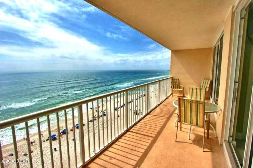 Majestic Tower II unit 1008 is the beach getaway you've been dreaming of! With nearly a 1300sq.ft floorplan, this oversized 2 bedroom, 2 bath gulf front condo is superb for entertaining and lives like a beach house in the sky! Riveting Gulf views from the kitchen, living room, and master bedroom are framed by very attractive, seaside inspired interiors with comfort and style in mind. This offering features all the extras such as tile flooring throughout, custom tiled backsplash a breakfast bar, wet bar & Costal Green Air system. Property is in immaculate condition and well maintained. The gourmet kitchen features breakfast bar, loads of cabinet space, and is fully stocked & family ready! Ocean Front master bedroom opens up to balcony, a very desirable feature on the beach! On suite master bath is large enough to accommodate a dressing area with vanity as a transition into the luxurious master bath complete with his/her sinks, jetted garden tub, & separate shower. 
Sunshine and warm gulf breezes abound from the large balcony - enjoy sunrise views in the morning and Sunset views in the evening Ã¢â‚¬" the ultimate in alfresco living! This condo is move in ready - great for second home, vacation rental or full time living. Majestic Beach Towers has some of the best, most consistent rental income on the beach and is truly THE resort destination in Panama City beach. If you are looking for a one of a kind property and a terrific investment, look no further! Resort Amenities include: 3 large outdoor pools, 2 large heated indoor pools, 2 kiddie pools, 3 hot tubs, H2O poolside bar & grill, Visions martini bar, deli/Starbucks, state of the art fitness center with his/hers steam & sauna,125 seat stadium seating movie theater/presentation center, conference center, tennis court, and much, more! This spectacular resort is located in the heart of Panama City Beach close to restaurants and entertainment, including famed Pier Park and the International Airport