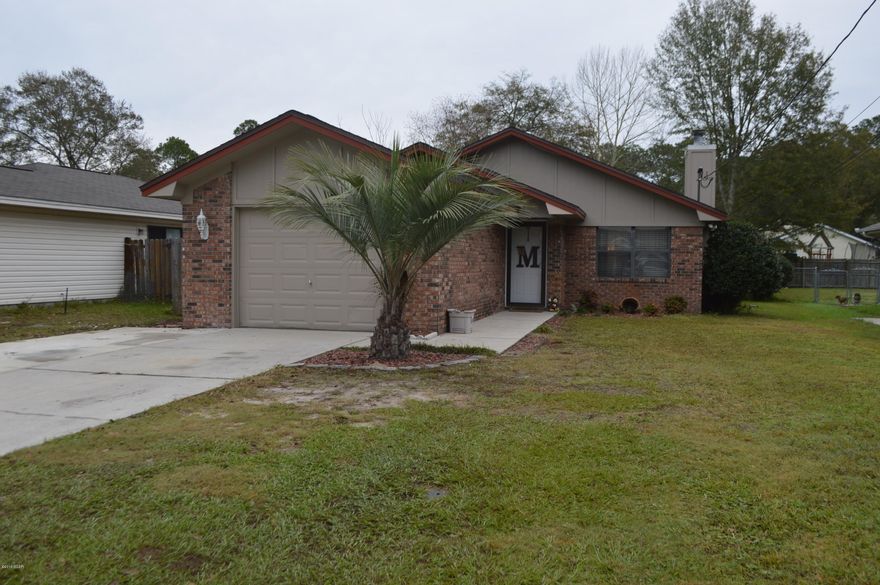 Lynn Haven only $137,000!! All recently updated! Roof is about 4 years old, AC is 2 years old and Hot water heater is only 4 years old. There are newer stainless appliances and updated flooring. The Living room is large and inviting with a wood burning fireplace. This full 2 bed 2 bath also has an office that could be used as a craft room, play room and more. A concrete patio and brick paved patio have been added to the side of the home to lead you to the large back yard. There is also a nice storage shed. Great neighborhood!