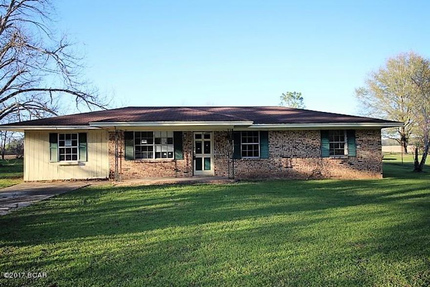 PRICE REDUCED!!    This brick 3 bedroom house is located on the outskirts of nice country town.  You will have a really cute and comfortable home when you repair and update her.  There is room for a garden in the back yard.  It will be a great place to retire to for rest and relaxation.  It has great potential!