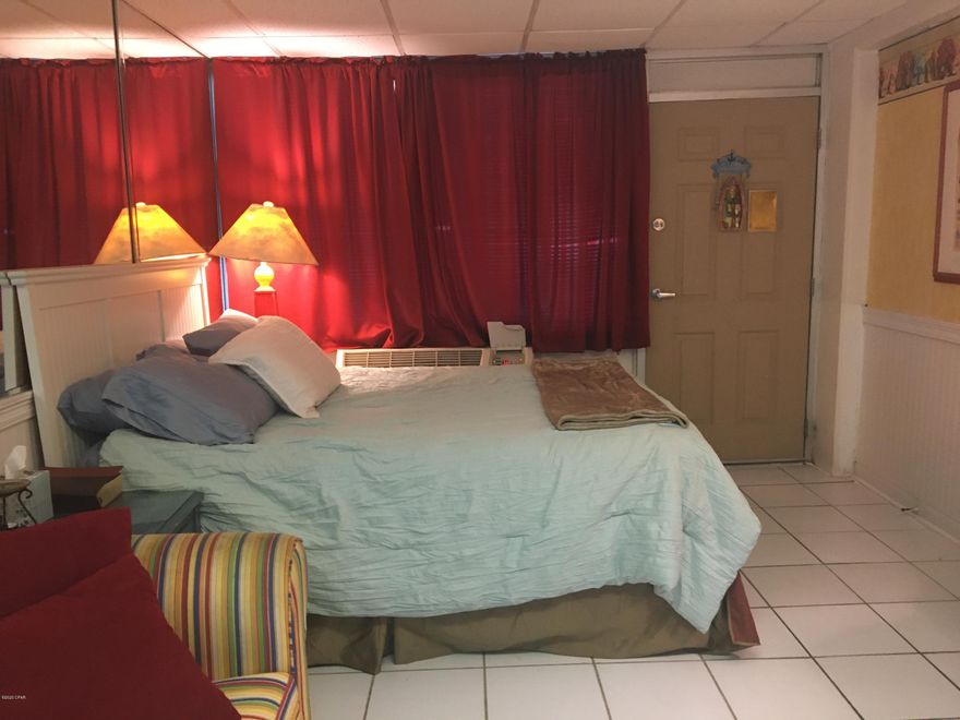 This furnished waterfront studio in FrontaineBleau is on the 2nd floor.  With a little paint and some updating, this unit would make a great rental or home for a single person.  Great location for shopping and dining.  Amenities include large swimming pool, BBQ grills, large deck to watch the sunrise or sunset, easy access to the beach.