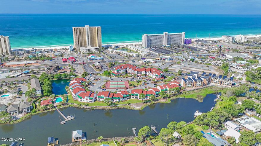 SELLER WILLING TO CONSIDER PAYING 6 MONTHS OF HOA UPFRONT FOR BUYER! LOCATION LOCATION LOCATION Amenities at this community include:  Gated Community, Building has a elevator, Boat Dock and Boat Parking, Fish Station Cleaning, Pool, Tennis and Pickleball Court, Sauna, Picnic area with barbecue pits, tables and chairs, and Community Room. Enjoy coastal living in this well-maintained 1-bedroom, 1-bath unit in a highly desirable location just a block to the white sandy beach. This property offers a functional layout in good condition, perfect as a primary residence, second home, or investment opportunity. Just a short walk to the new tootsies, local restaurants, shops, and nearby activities, you'll love the convenience and lifestyle this location provides. Boating and fishing enthusiasts will appreciate the on-site dock with direct access to the beautiful emerald green water of the Gulf, making it easy to spend your days relaxing on the water. Don't miss your chance to own in this prime area with both relaxation and recreation right at your doorstep.  AC - 2021, Freshly Painted 2024, Furnishings 2024, Bathroom remolded 2024, Newer Kitchen Appliances 2024 (minus dishwasher) Come and See!!