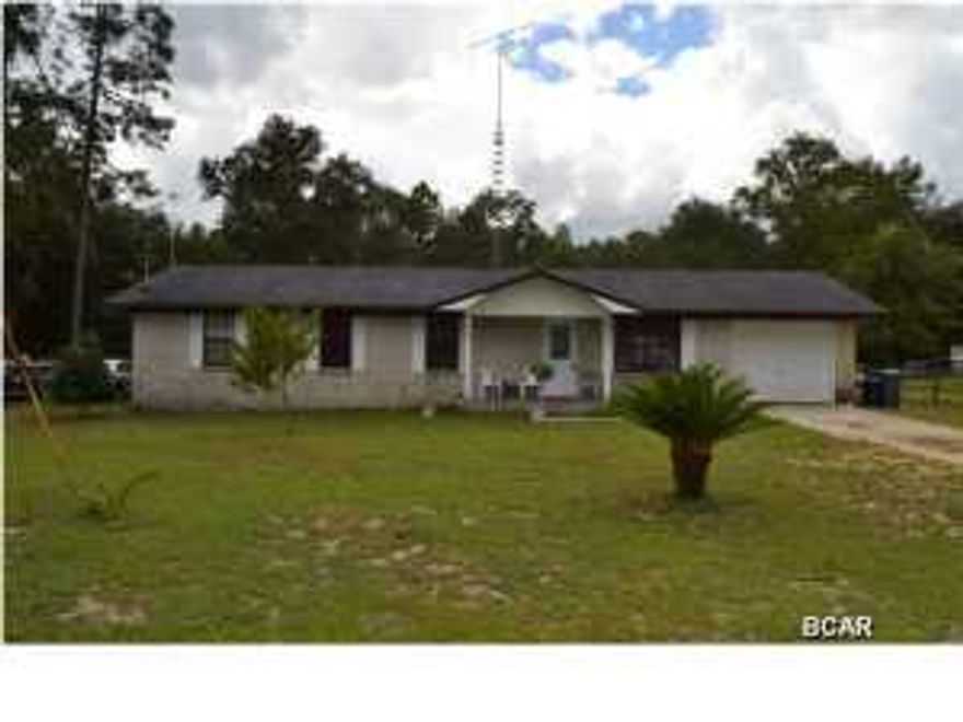 Very solid 4 bedroom, 2 bath home located close to Deerpoint Lake and with close access to a public boat launch. This home is perfect for those that may need 4 bedrooms and over 1/2 acre in a country setting. The interior is spacious with tile floors in the living room and kitchen. The master bedroom has a walk in closet and private master bath. The exterior of the home is solid brick for ease of maintenance. The lot measures 100 feet wide by 225 deep and hasplenty of room to build a larger garage or to park boats or RVs. Come see this home, it is priced to sell and seller is motivated!