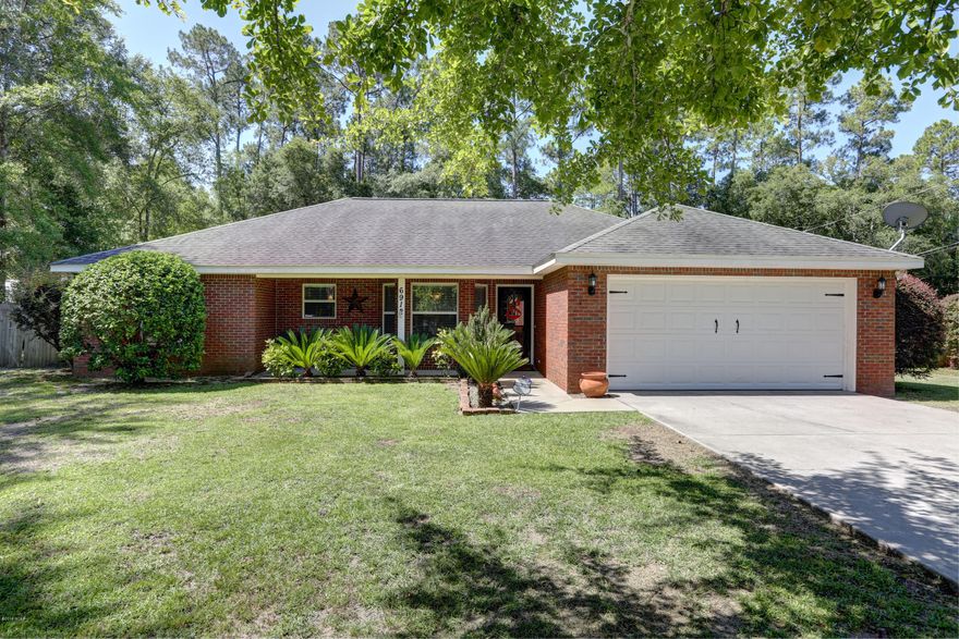 NEWER HOME ON ALMOST 1/2 ACRE. BEAUTIFUL BRICK HOME BUILT IN 2006 WITH OPEN FLOOR PLAN, LAMINATE HARDWOOD FLOORS, CERAMIC TILE, SPLIT  FLOOR PLAN. YOU CAN ENJOY THE FIREPLACE DURING THE WINTER AND THE BACK PORCH DURING THE SUMMER. LARGE LAUNDRY ROOM WITH TONS OF STORAGE. MASTER BEDROOM IS A NICE SIZE AND HAS DOUBLE VANITIES.