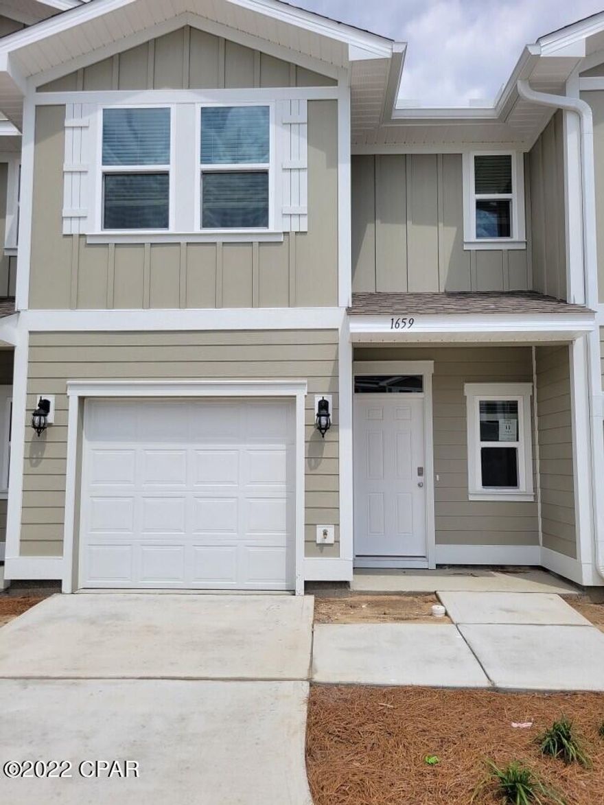 Welcome to Landin's Landing! The Palm plan is a 3 bedroom, 2.5 bath interior townhome. As you enter, the long entry leads to an open living and dining area. The kitchen has a breakfast bar and is an open concept. This plan features a single car garage and all bedrooms are on the second level. Bedroom 1 has a large bath with walk-in shower and glass door as well as a walk-in closet. The additional bedrooms are situated at the back of the townhome as well as a full bath and laundry area. This is our newest townhome community and it is centrally located in Lynn Haven. This community is close in proximity to schools, shopping and dining. Enjoy the convenience of having a central mail box station, street lights throughout the community and extended driveways.