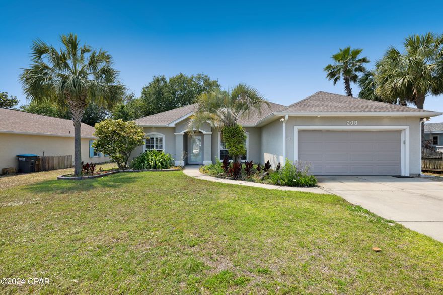 CURRENTLY UNDER CONTRACT, SELLER WILL CONSIDER BACKUP OFFERS  Welcome home!  This beautiful  home is in a high demand, centrally located, neighborhood only a half a mile to the BEACH! This home has many added details like tile floors throughout, trey lighted ceilings, granite countertops, large pantry, newer appliances include smooth top range, microwave, and refrigerator.  The open living concept makes this the perfect family home for entertaining with entertainment area and wine refrigerator in the living room.  The primary bedroom and bath are a must see...spacious bath with double sink vanity, separate shower, large jacuzzi garden tub and an amazing walk-in closet.  Enjoy outdoor entertaining and dining on your covered porch that is accessible from the living room area. Beautifully landscaped with mature palm trees. Lastly, this home features a full array of solar panels that provide the majority of the power to the home.  This home is within minutes of fine dining, Pier Park, Frank Brown Park, Sports Complex, entertainment, and most importantly THE WORLDS MOST BEAUTIFUL BEACHES!