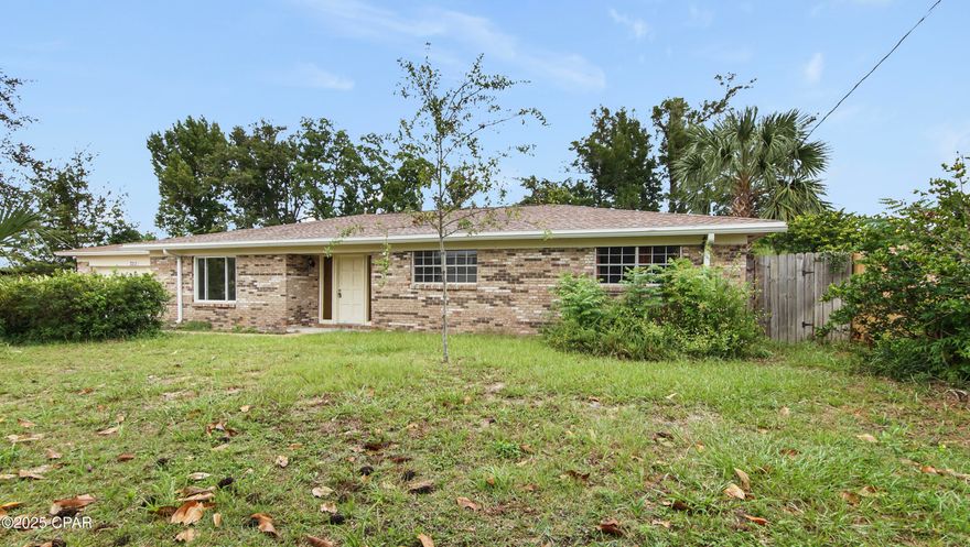 Come tour this charming brick home with endless potential and a peaceful setting that backs up to Callaway Bayou. Perfect for those looking to make it their own or for investors seeking their next opportunity, this property offers space, functionality, and a great location.

Inside, you'll find a comfortable floor plan with multiple living areas, tile flooring, and large windows that fill the home with natural light. The kitchen features new cabinetry, generous storage, and plenty of counter space. An enclosed patio overlooks the backyard and bayou, creating a flexible area ideal for relaxing, entertaining, or enjoying quiet mornings with a view.

Outside, the brick exterior, two-car garage, and the mature trees bring timeless charm! The fenced yard provides privacy and room to enjoy the natural surroundings. Conveniently located near shopping, dining, schools, and Tyndall Air Force Base, this home offers both opportunity and potential in one inviting package. 

Call a REALTOR today to schedule a private home tour. If important, please verify all measurements.