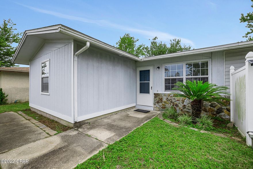 Great investment property or first home in Lynn Haven! This 2-bedroom /2-bathroom residence has been recently painted, had new LVP floors installed, so it's fresh-and-clean and move-in ready. There's an additional storage area and a large workshop in the backyard, with privacy fencing. The roof was installed in 2019, seller says HVAC was replaced around 4-years ago and Water Heater was replaced around 7-years ago. This attached single family home on Bradley circle is right off Jenks ave, centrally located, and is the best priced unit for the area. All Information is deemed to be reliable, but is not guaranteed, buyer to verify if important.