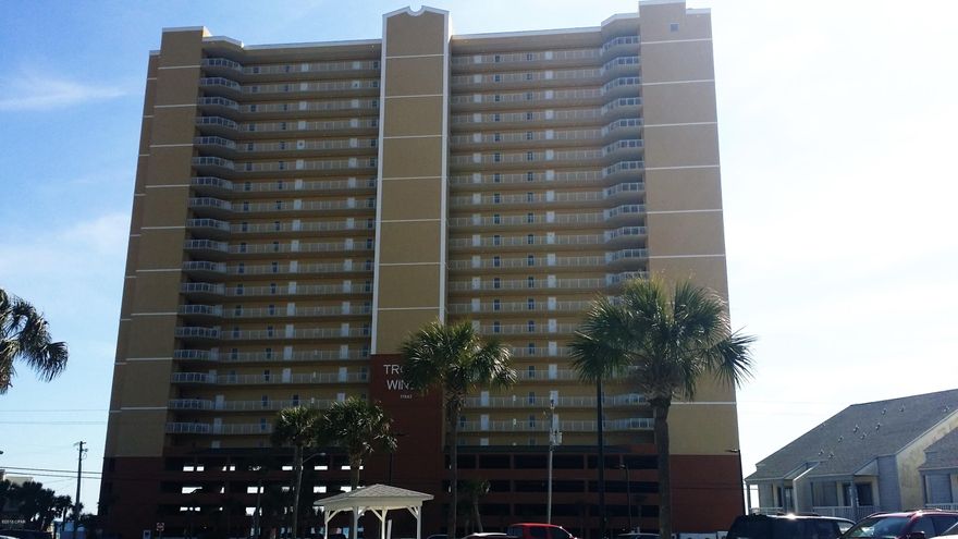 This is a prize, tenth-floor, two-bedroom, two-bath unit on the west end of Panama City Beach!  You won't believe the stunning Gulf views from the spacious balcony!  This non-rental unit shows pride of ownership with its beautiful hardwood floors, stainless steel appliances and tiled kitchen backsplash.  It is being sold as currently furnished.  As per Seller,the air handler, air condenser, and hot water heater were replaced in 2017.  The master bathroom has a beautiful walk-in shower. The balcony has been beautifully tiled as per HOA guidelines and the carpet in both bedrooms was replaced last year.  The balcony furniture is of durable PVC piping.  A reserved parking space, #23 on ground floor, conveys with the unit.  Internet and basic cable TV are included in the reasonable condo fees! This complex is loaded with amenities including an indoor/outdoor pool, hot tub, sauna, steam room, exercise room, community room, grill and large sunning area!