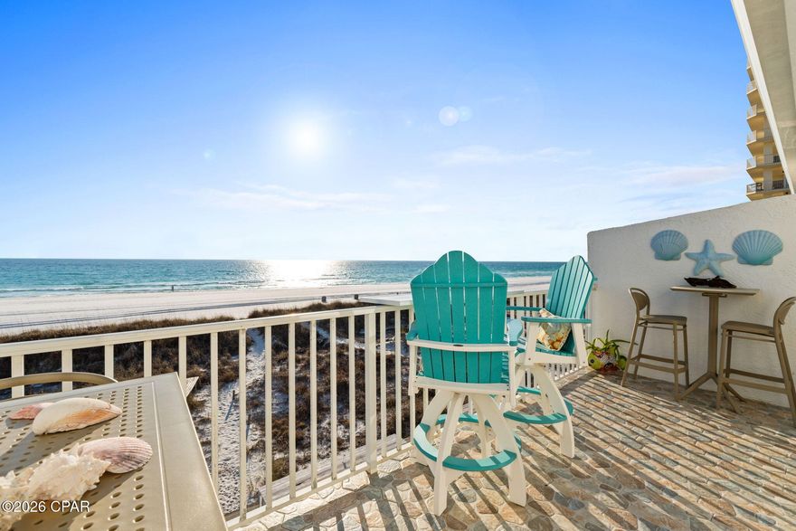 Gulf-Front Living at Its Finest - On the Beach! Experience coastal paradise from this rarely available gulf-front, low-rise condominium located on the 2nd floor (top floor), just steps from the sugar-white sands and surf of the Gulf of Mexico. Wake up to the soothing sound of waves and water views from your private balcony — the perfect place for morning coffee or evening sunsets. Inside, enjoy an open, light-filled layout with thoughtful updates throughout. The kitchen and living areas flow seamlessly, ideal for both relaxed living and entertaining guests. Amazing wood-like tile through the entire home. The kitchen boasts beautiful cabinetry, a copper apron sink, and stunning quartz countertops. Also matching copper backsplash and a high-end Whirlpool appliance package.  A spacious en-suite with walk-in-closet. Currently a permanent residence and pride of ownership shows throughout. Previously a 2 bath and owners coverted to 1 bath, could easily be changed back and owners have the matching flooring.on the second story offers elevated views while still providing easy access. The current owners have the living space set up as the master bedroom to wake up to the view! This well-maintained condo is part of a low-density community that enhances privacy and charm while placing you in close proximity to local dining, shopping, and entertainment options. It may have the lowest association fees that you will find anywhere. Hvac and water heater are less than 4 years old. Whether you're seeking a permanent residence, vacation escape, or investment property, this Gulf-front gem delivers unparalleled beach lifestyle living. Don't miss your chance to own a piece of coastal bliss!