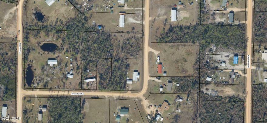 Two acre parcel of land in Youngstown.  Property is wooded and has an old well and septic on the property.  Seller has no knowledge of either.  The septic tank was installed in 2002. 

 This property would be great for a site built home or mobile home.  Horses are allowed in this area.