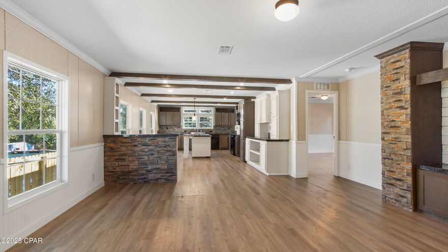 CURRENTLY UNDER CONTRACT, SELLER WILL CONSIDER BACKUP OFFERS. Welcome to 212 Everitt Ave — a charming 3-bedroom, 2-bath home offering the perfect blend of modern finishes, functional space, and affordability in a convenient central location. Built in 2019,  this home features an open-concept layout, exposed wood ceiling beams, a large island kitchen with upgraded cabinetry and tile accents, and abundant natural light throughout.

The oversized primary suite includes a spa-style bath with a soaking tub, walk-in shower, and dual vanities & seating area. Additional highlights include a spacious laundry/mud room, vinyl plank flooring, and a fenced yard — ideal for pets, play, and outdoor living.

Situated on a corner lot with ample parking, this home is minutes to Tyndall AFB, downtown Panama City, shopping, schools, parks, and the waterfront.