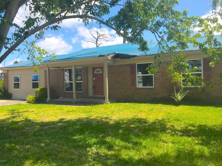 GREAT fix & flip or investment opportunity with this 4 Bedroom / 2 Bath home in the Greentree Heights neighborhood in Panama City! This brick home is 1,868 sqft. (heated) and 2,082 sqft. (total) and sits on a quiet cel-de-sac in a great neighborhood! Inside you have some great features including a renovated kitchen with beautiful wood-like tile floors! Outside you've got a detached 2-car garage, as well as an above ground pool in the backyard! The home was damaged by Hurricane Michael - Some work has already been done, but there's some still to go including drywall, roof, flooring, etc.; But at this price it is a steal! IT WON'T LAST LONG - So act quickly! --- CASH BUYERS ONLY ---