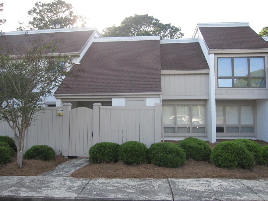 This townhouse style condo overlooks the Club Meadows golf course 12th fairway. Furnished and move in ready. Bay Point is a gated community with 2 world class golf courses, 4 restaurants, clay tennis courts, a full service marina, 24 hour roving security, and an on site Sheraton Hotel. Measurements approximate.