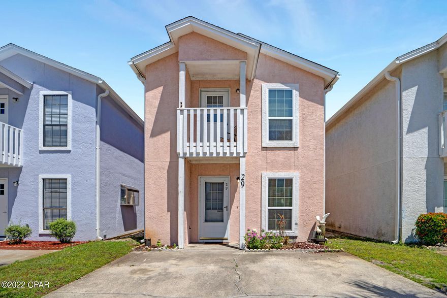 CURRENTLY UNDER CONTRACT, SELLER ACCEPTING BACKUP OFFERS. Great vacation home/investment property at the beach! 2 bedroom 2.5 bath townhome with no shared living area walls. Walk across the street to access the sandy white beach for fun in the sun! This community is convenient to Hwy 79, Pier Park and Frank Brown Park.