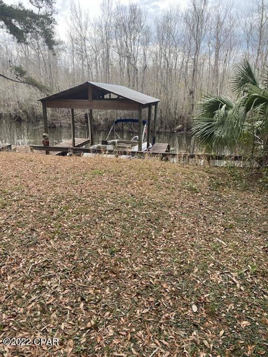 What an awesome opportunity to live in a rural fish camp environment on a canal water front lot. Build a sweet home away from home retreat or primary residence.  Steel field fish camp is a great fishing retreat; this community has a public park and freshwater boat launch which merges into a salt water canal to the two sister river, the Choctawhatchee river and on to the Choctawhatchee bay (No need to freshwater rinse the boat on the way back).This area of Florida is preserved with Natural Plant life and indigenous wildlife. You will see some of Florida's most beautiful gifts here. This opportunity home is only 20 min from The World's Most Beautiful Beaches, Famous Pier Park Shopping, and PCB International airport.