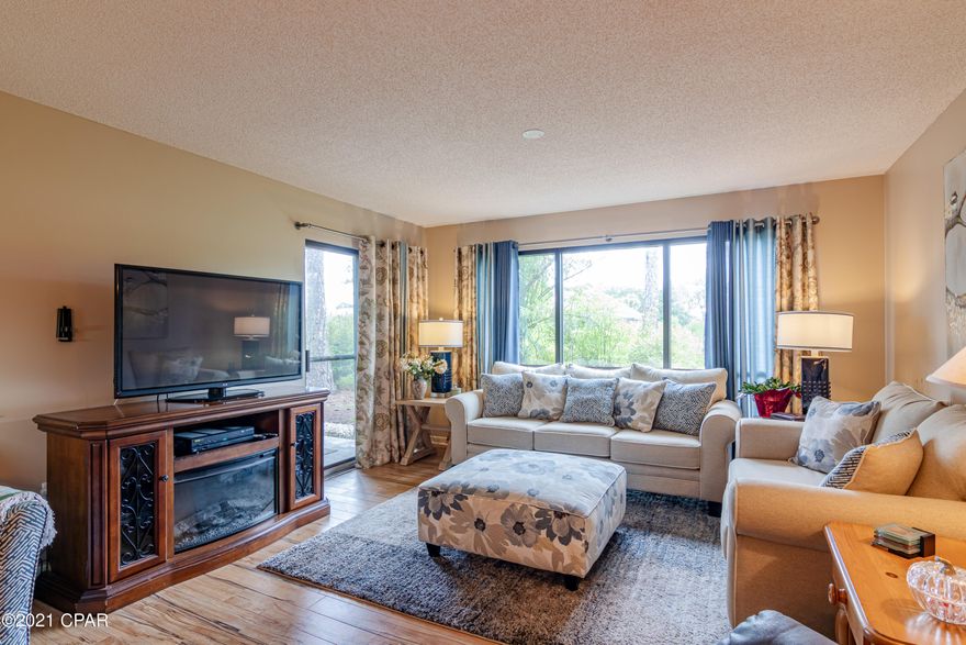 Whether you are looking for your HOMESTEAD or your HOME away from home, this GROUND FLOOR home is your DESTINATION. With the well-designed, SPLIT BEDROOM PLAN, you'll find AMPLE storage and GENEROUS ROOM SIZES. The LIGHT-FILLED ROOMS are SPACIOUS and move easily throughout both the interior and beyond to TWO PLEASANT PATIOS. With a location closer to the Hathaway Bridge, you will be able to avoid much of the traffic that typically moves to the more western locations of the beach. This SMALL complex is tucked within the beautiful community of THE GLADES very close to the SUGAR SHORE of our INCREDIBLE beaches. Fine dining is within a few minutes; shopping and entertainment nearby.