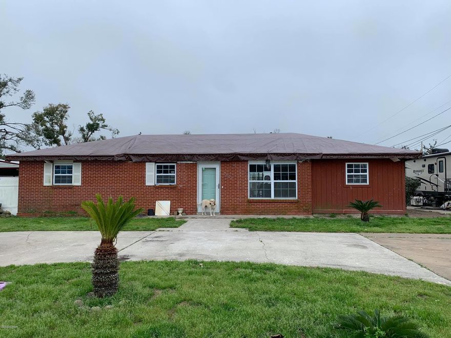 HUGE CORNER LOT! This brick home would make for a great flip or rental once it is fixed up. The property has a 12X24 shop with a 20X24 carport, AC & windows approx 5 years old and 12X24 florida room that could be put back together. Home has been stripped to the studs. Public sewer & public water! 80 gallon hot water heater. Half circle driveway. 

Fully renovated homes with similar sq/ft  within 1 mile have sold up to 179k. -4904 Colorado Street,PC SOLD 179k

-108 Abigail Lane, PC  SOLD for 175k 

-106 Rob Court, PC SOLD for 173k

-908 Huntington Drive, PC SOLD for 172k

-722 Flight Ave, PC SOLD for 161k (ask your realtor for a full list of sold comps) 

***OWNERS DOGS ARE ON PROPERTY AND NO FENCE - DO NOT GO ON PROPERTY WITHOUT AN APPOINTMENT WITH A REALTOR! All ages and dimensions are estimated, please confirm if important.