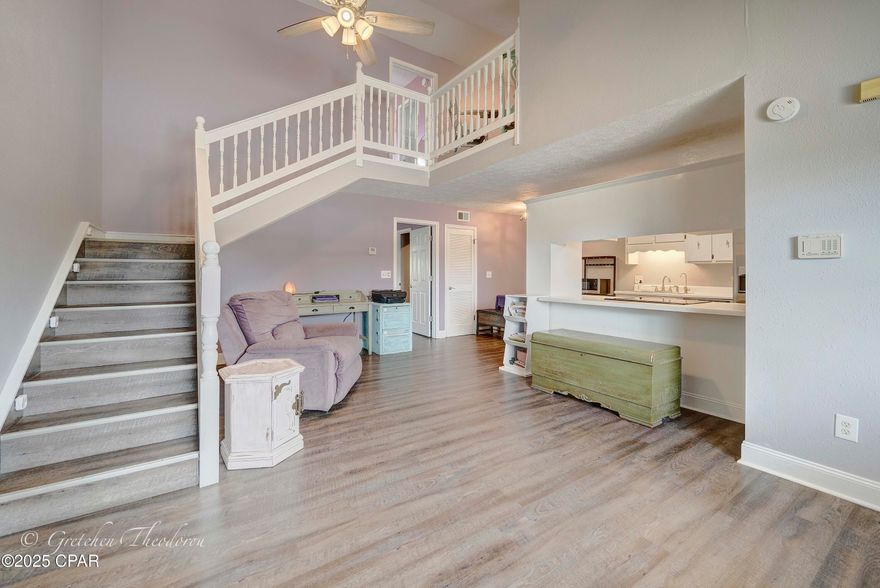 Beautiful townhome located in Panama City! Renovated with GORGEOUS vinyl plank flooring, new paint, appliances, vanities, and more! With tall ceilings, ample storage, large closets in both bedrooms, full sized laundry room and a wonderful layout, every room is spacious and open. Complimented with a beautiful wrapping staircase that overlooks the living space. Master suite opens with French doors into the open Florida room adding an additional 219 sq ft of living space, which is so versatile it can be used for anything! Enjoy the outdoor space with the full privacy fenced backyard! Set up your showing today! Call your agent to view this amazing home!